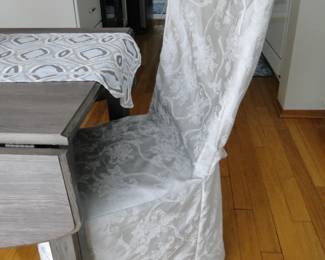 Slip a cover over the chair for a more elegant, candle light evening supper.