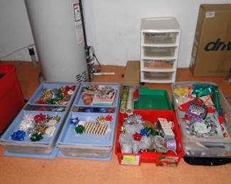 Ribbons and bows, and wrapping paper too!!  Storage boxes are included in the price