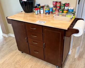 Kitchen Island (oh and look, there's food too) better prices than the store. (the vase on the left was purchased by the new home owner)