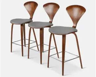 Three Norman Cherner Walnut Bar Stools
