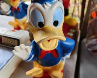 Lots of Moving Metal Toys, Cars, etc. Donald Duck Bank here. 