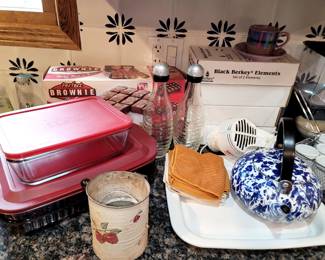 Kitchen misc, Berkey Elements, Brownie pans, vintage cherry flour sifter, Graniteware/Splatter/Enamelware Tea Kettle