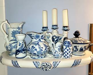 Blue Danube pitchers and other pieces. Blue and white painted ceramic shelf