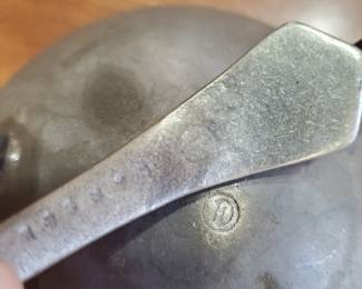 Label on small pot and ladle 