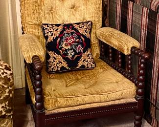 Antique Mahogany Spool Occasional chair in the original Panne Velvet tufted upholstery and gorgeous beading along frame. 
Original solid Brass wheels on the front legs. 