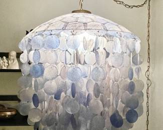 1950s Periwinkle Blue Capiz Shell swag light with Brass top. 
Approx 20"w • 30"tall 
Single standard bulb 
