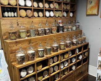 Large section of candles and home fragrance items. Fixture is available for purchase with a mid-March pickup date.