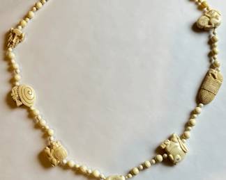 Vintage 1940s Handcrafted Bone Necklace With Animal Figures Signed JR
Lot #: 23