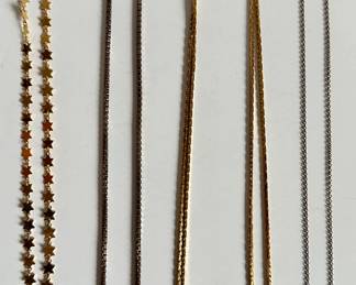 12 Karat Gold Chain, 2 Sterling Silver Chains Marked 925 & Star Chain
Lot #: 69