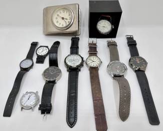 9 Watches & 1 Vintage Clip Clock: Timex, Casio & More
Lot #: 74