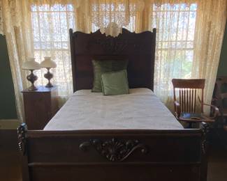 Gorgeous carved mahogany bed! Lace curtains also for sale!