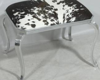 928 - Butler Specialty cowhide ottoman chrome legs 21 x 26 x 16
