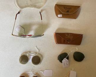 Ray ban clip on glasses, three different tints of clip on glasses.