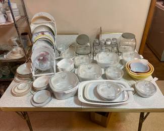 pyrex, corning ware, spice rack with jars.