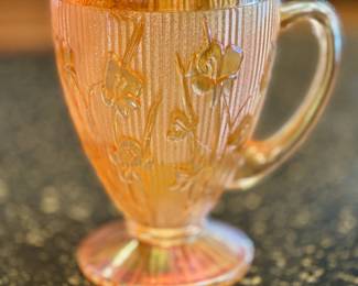 Jeanette iridescent marigold carnival glass pitcher, Iris Herringbone pattern.