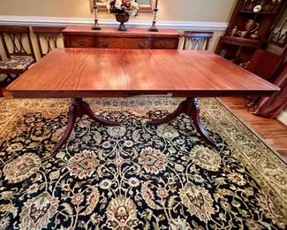 Duncan Phyfe dining table, surface cleared.