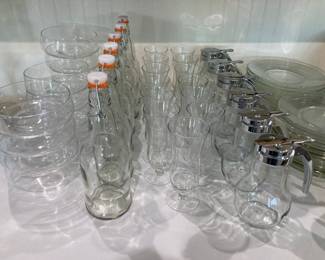 glassware, stoppered bottles, syrup dispensers, clear plates