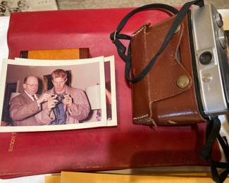 All American Bob Lilly being shown his new Kodak camera at the Kodak factory, and Holub's Kodak