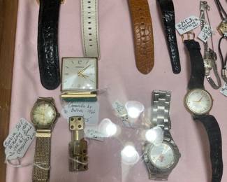 men's watches, buckle, and dice lighter