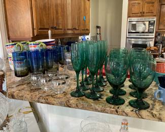 glassware, including cobalt to amber, and a martini set