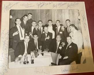 All Americans signed. Merlin Olsen back row last right.