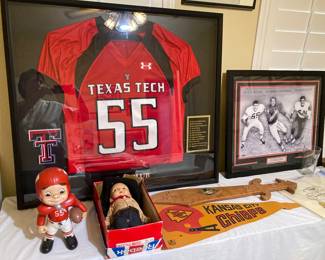 Replica of Holub's Texas Tech Red Raider jersey #55, retired in 1960; Kansas City Chiefs vintage pennant, etc.