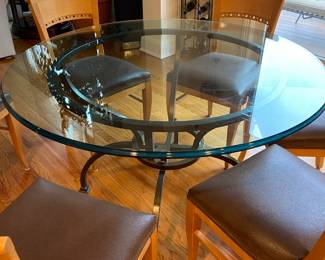 Round Kitchen Table with Beveled Glass Top and Iron Base, Measures 48" round, 6 Chairs Custom Covered Leather Fabric.