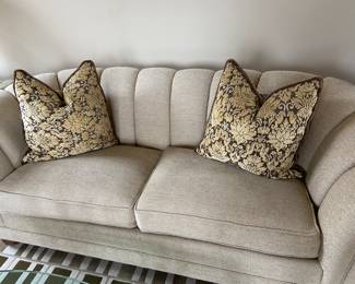 Channel Back Sofa with Curved Sides in a lovely Neutral Fabric and Custom Made Chenille/Velvet Pillows.
