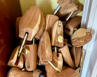 Many pairs cedar shoe forms/stretchers 