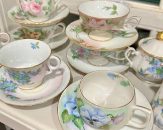 These are 3 pc tea cup sets (not showing the larger bottom plates)