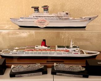 Models…top one is a liquor bottle 