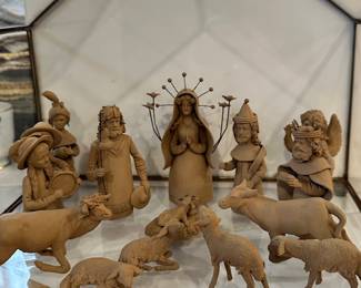 Intricate Nativity  / tiny handcrafted pottery pieces in a glass house