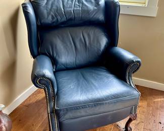 In the little guest room / leather wingback