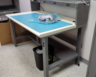 Uline Soldering Station Workbench, 46" x 60" x 36", Contents Not Included, With Uline Non-Conductive Mat, 48" x 24", And Shelf With Built In Power Strip, 12" x 60" x 12"