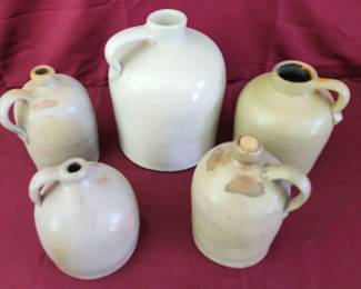 5 Primitive Stoneware Crockery With Hook Handles.