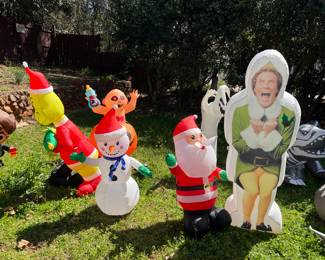 Inflatables - Holidays have blown up at this house! Santa, snowman, Elf