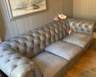 Leather tufted sofa