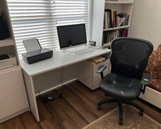Office chair; desk; computers and printers