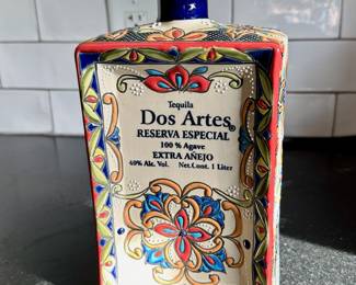 Collectible Dos Aries empty tequila bottle.