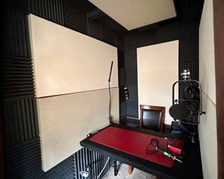 In-home podcast studio lined with Auralex brand acoustical foam panels.  Disassembles for easy transport.  Marked for easy reassembly.  Electronic equipment NOT for sale.