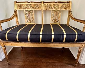 Gold-gilt hand-carved wooden bench.