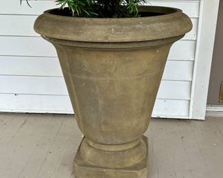 One of a pair of large planters.