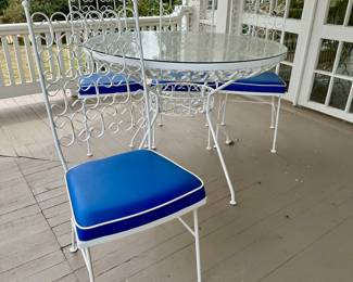 Mid-century Arthur Umanoff 5-piece wrought iron dining set.