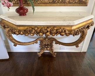 French gold gilt console with very thick marble top.