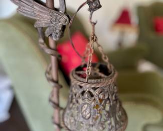 Detail of deco-era bronze griffin floor standing lamp.  Two available.