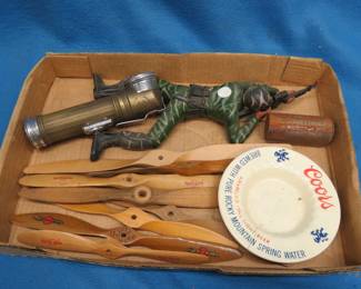 Lot 290. Wooden Propellers, Boy Scout Flashlight, Crawling Solider, and More