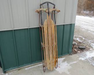 Lot 250. 5-foot Speedway iron-runner sled