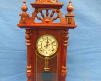 Lot 136. Battery-operated wall clock.&nbsp; 32" tall.&nbsp; Untested.