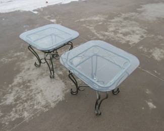 Lot 328. Two glass-topped end tables