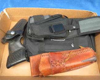 Lot 345. Holsters, a Glock bag, and more